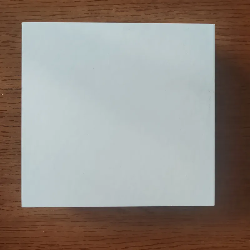 Ceiling presence sensor front view with packaging